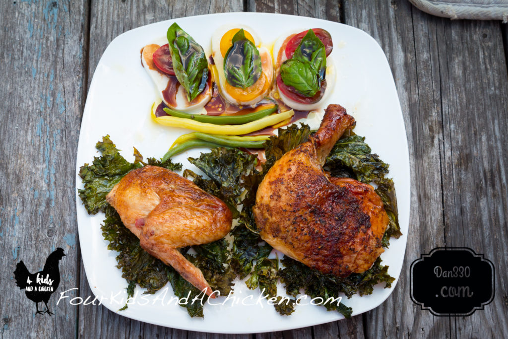 whole chicken on the grill in cast iron skillet
